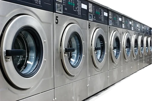 Commercial laundromat washing machines serviced by Extra Wrench